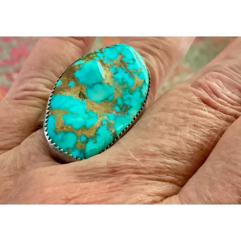 Gorgeous southwest turquoise w gold veining in a sandcast ring